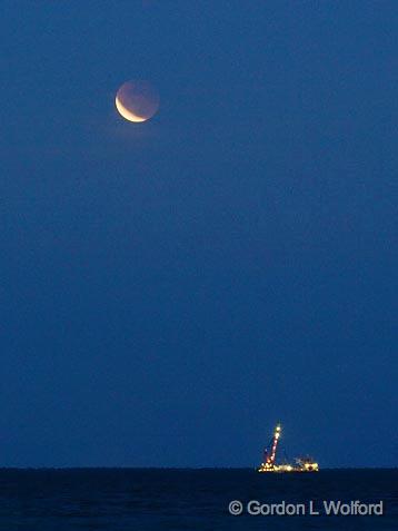 Lunar Eclipse_56177.jpg - Moon Over Offshore Platform (3 March 2007) in the Gulf of Mexico at the entrance to Mobile Bay. Photographed from Pelican Point on Dauphin Island, Alabama USA.